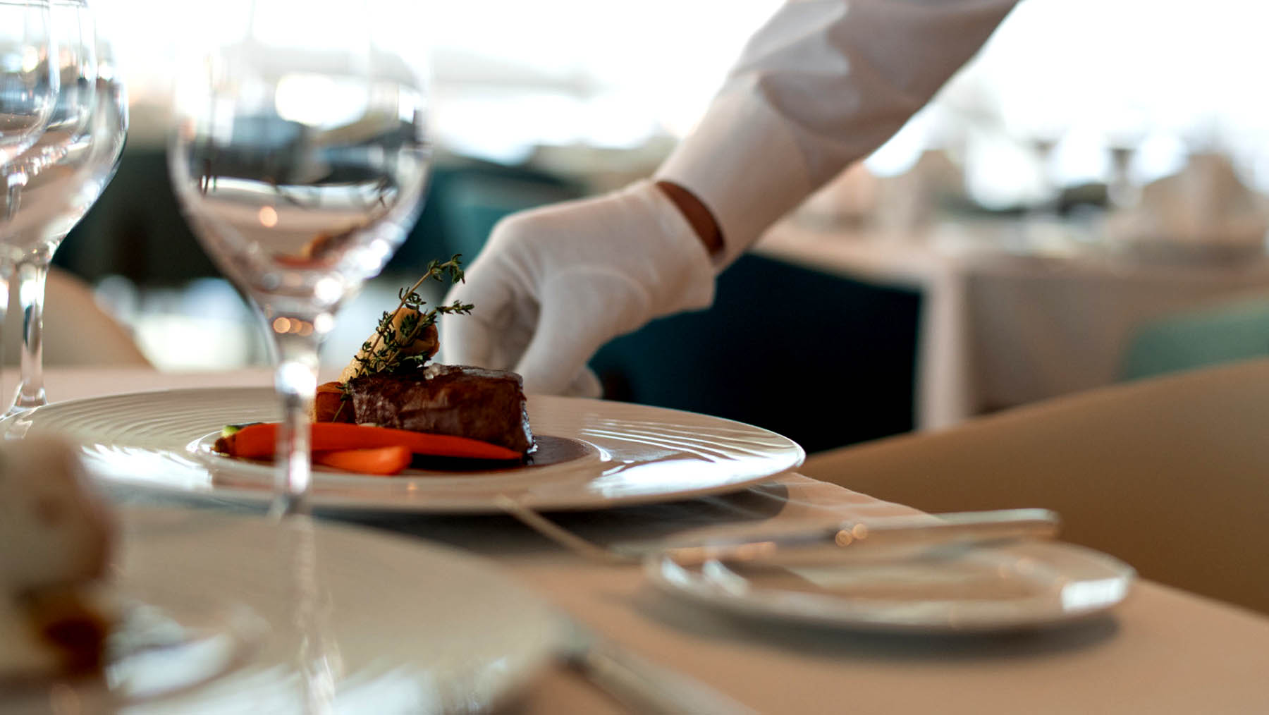 Guests are treated to a sumptuous meal aboard Ponant luxury ship.